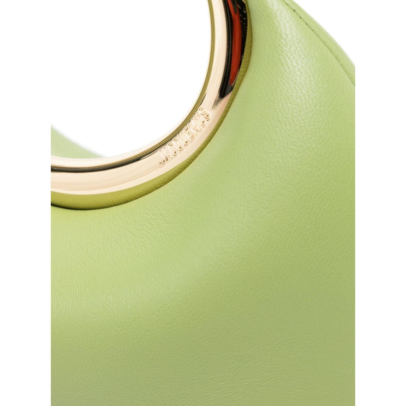 JACQUEMUS Bags.. Green Clutches JACQUEMUS