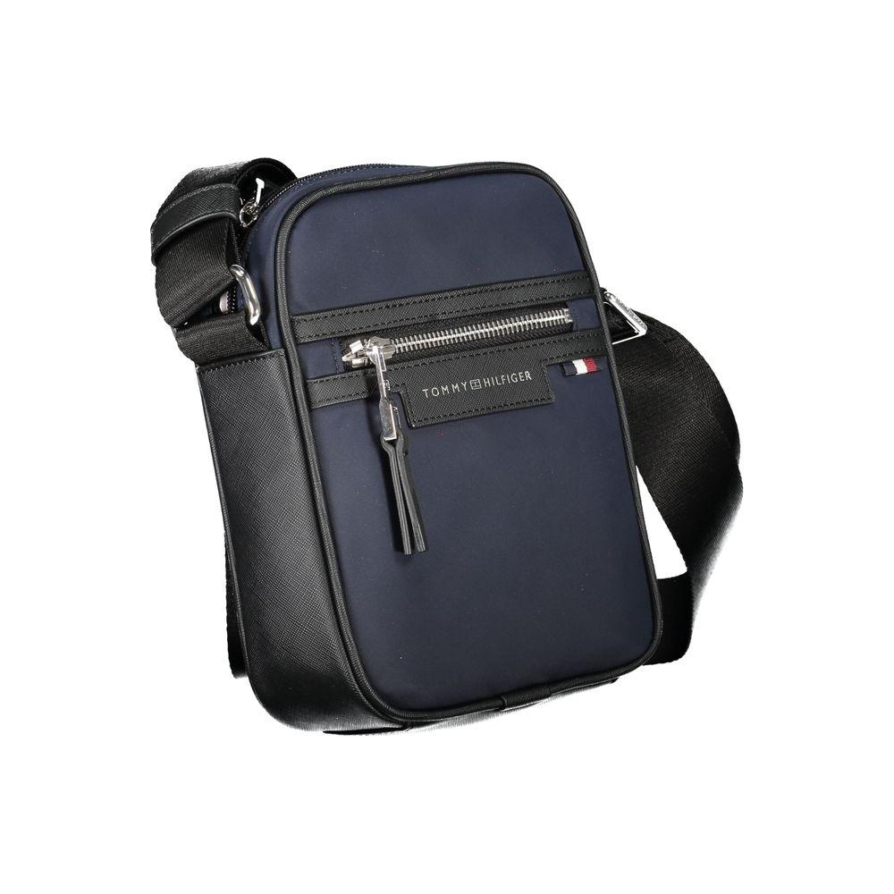 Front view with bag zipped and handles upright.